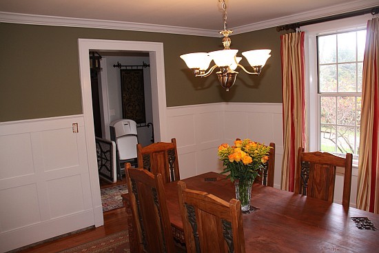 Decorative applique as tall wainscoting in a room