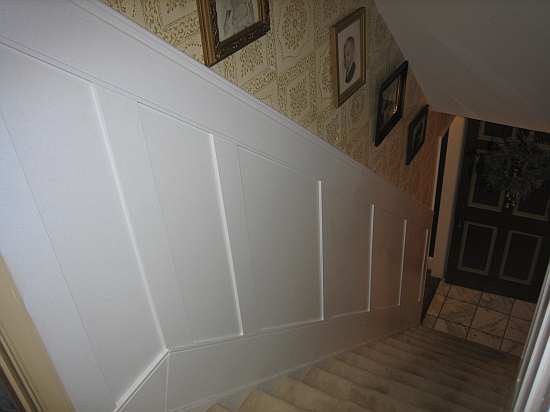 Flat panel wainscoting on stairs