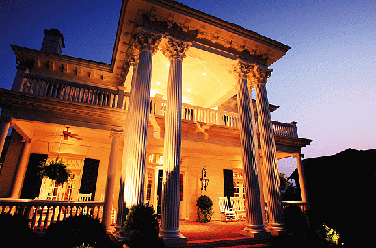 Large fluted columns with corinthian capitals