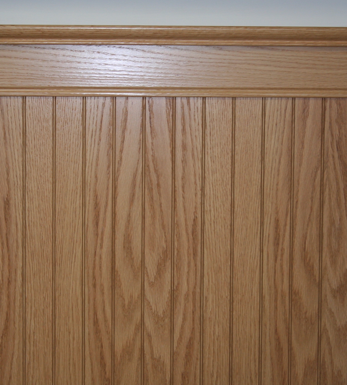 Red oak hardwood veneered beadboard for interior application