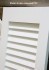 A close up look at a Premier Louvered PVC Shutter