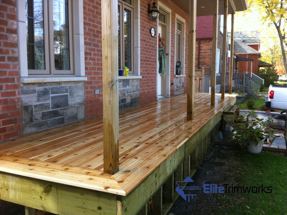 A picture of wooden porch before PVC wraps are installed