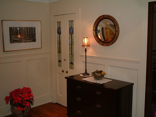 painted recessed panel wainscoting in hallway of home