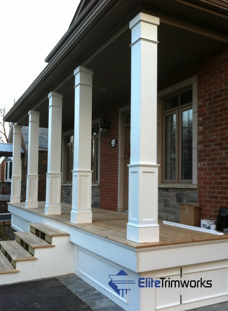 Side view of half-panelled pvc column wraps on front porch